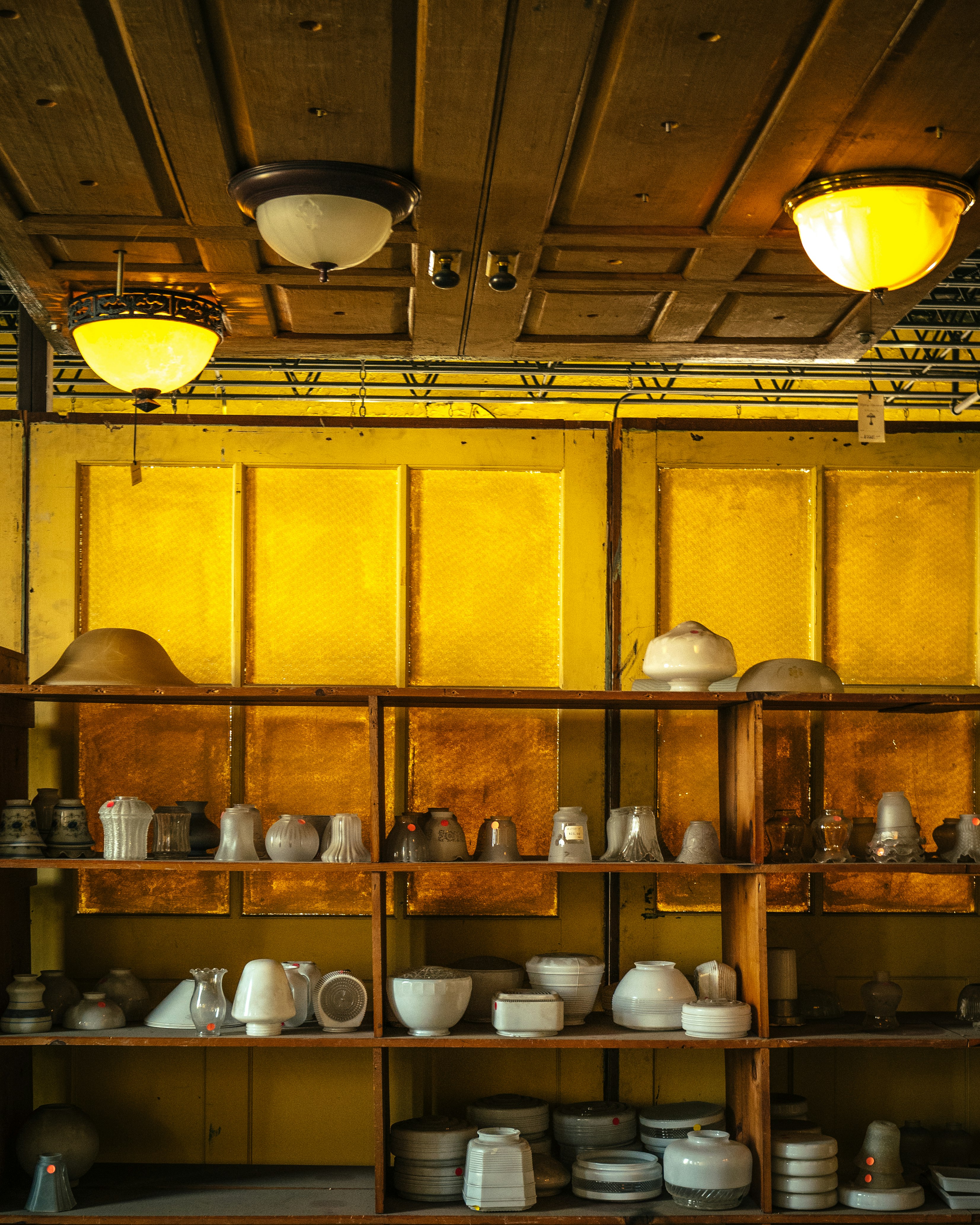 stainless steel pendant lamps turned on in kitchen